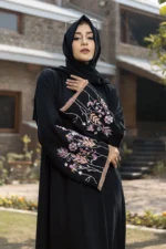 Fabeha Black Abaya by Alsanaya – Black Nida fabric with delicate embroidery and thread work on sleeves, includes matching hijab