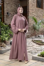 “Aidah Abaya by Al Sanaya with pintux and stone embellishments”