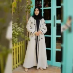 Cream Georgette Abaya with Floral Detailing by Alsanaya