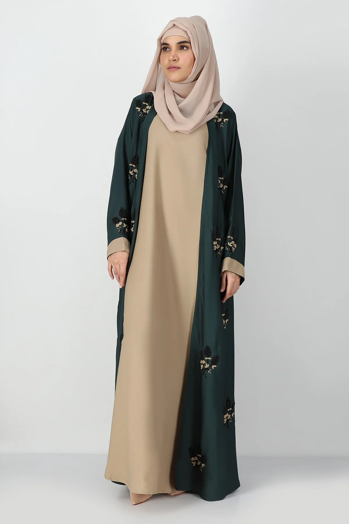 A stylish assortment of abayas showcasing the latest fashion trends for 2024 in Pakistan- Al Sanaya