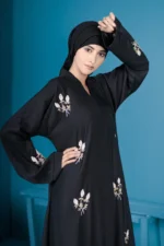 Hiba Abaya by Alsanaya – Black Nidah fabric, designed for elegance and comfort, requires dry cleaning only