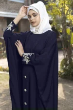 “Mahira Abaya in Black, Blue, and Green with butterfly style - Al Sanaya”