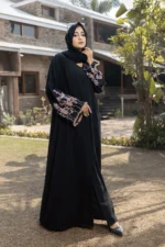 “Aaima Black Abaya by Al Sanaya with delicate embroidery on sleeves”