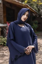 "Naglay Cutwork Abaya in Blue with Stone Embellishments and Chiffon Scarf by Al Sanaya"