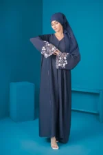 Falisha Cut Work Abaya by Alsanaya – Royal blue Nidah fabric with cut work, embroidery, and silver stone embellishments, includes matching blue scarf