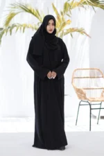 Khuala Black Zoom Nidah Abaya with matching hijab, featuring elegant design and luxurious fabric